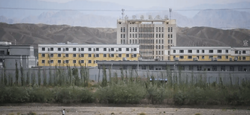 How to help the Uyghurs. A large facility that resembles a prison photographed in Xinjiang.