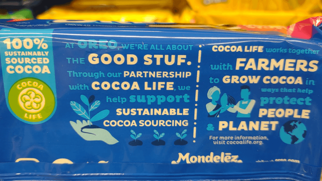 Mondelez’s Cocoa Life logo displayed on a package of Oreos, along with the message, 100% sustainably sourced cocoa. In-house ethical souring logos: trust, avoid or ignore?